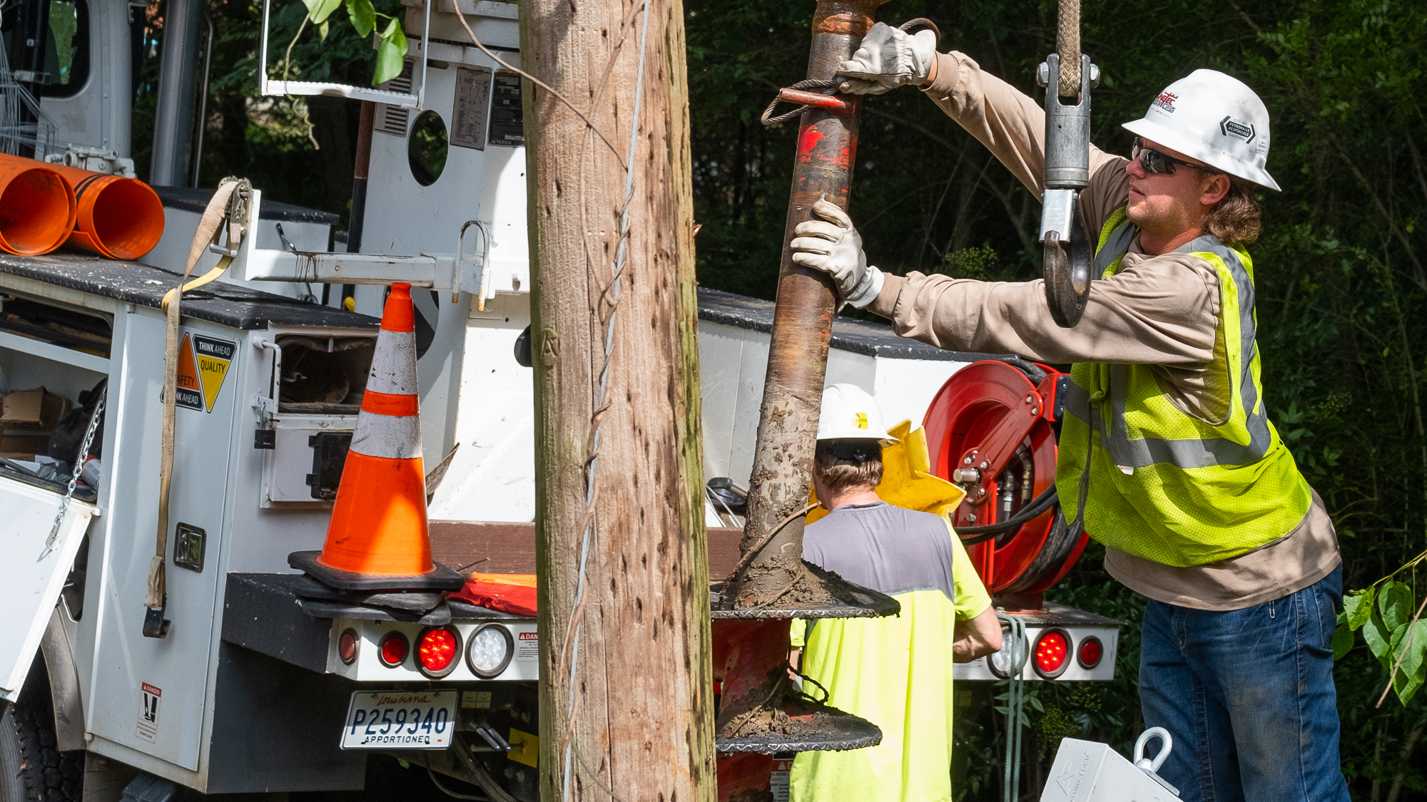 Replacing broken poles is a big part of storm restoration, and there have been many.