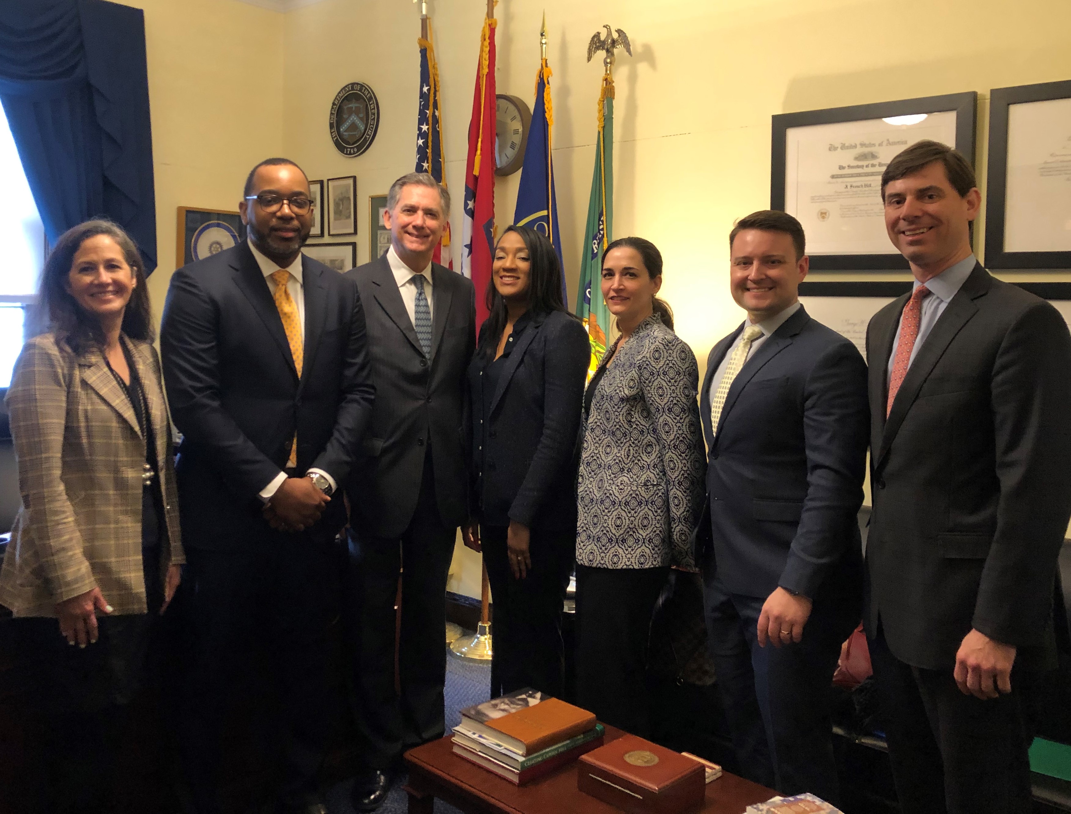 Team members with Arkansas Representative French Hill (third from left).