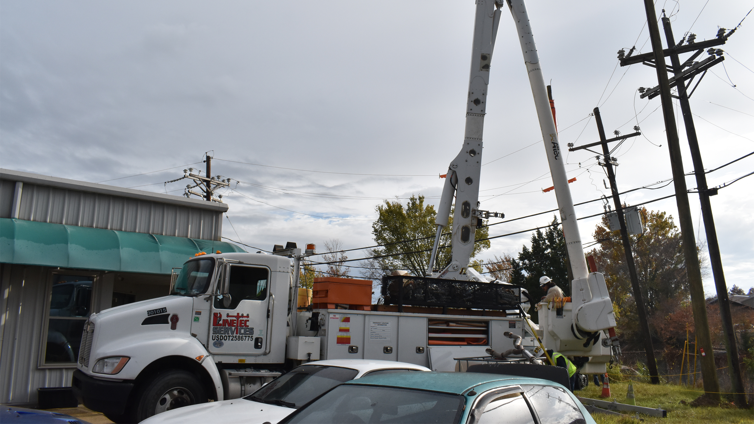 Pictured is a crew working in an alley behind a business located along Cedar Park Avenue in Baton Rouge.