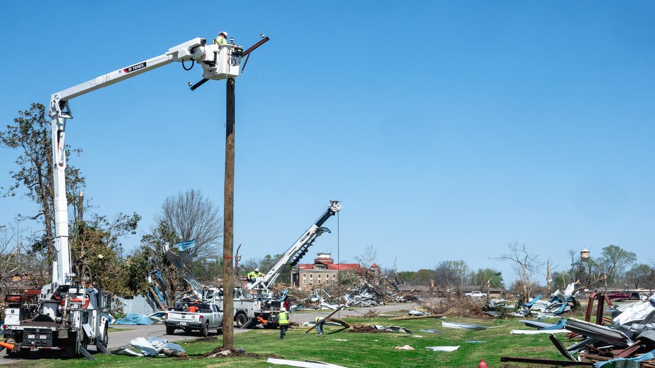 Entergy Mississippi crews work to replace poles in Rolling Fork after a devastating March 24th tornado.
