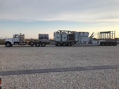 A mobile substation on loan from Oncor arrives in Hardin County.