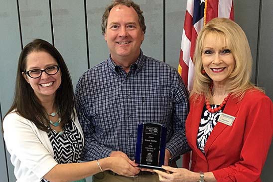 Entergy employee Steve Miller received the VITA Volunteer of the Year award from Capital Area United Way in April. Congratulating him are Heather Otten of CAUW (left) and Diane Denton of the Internal Revenue Service (right).