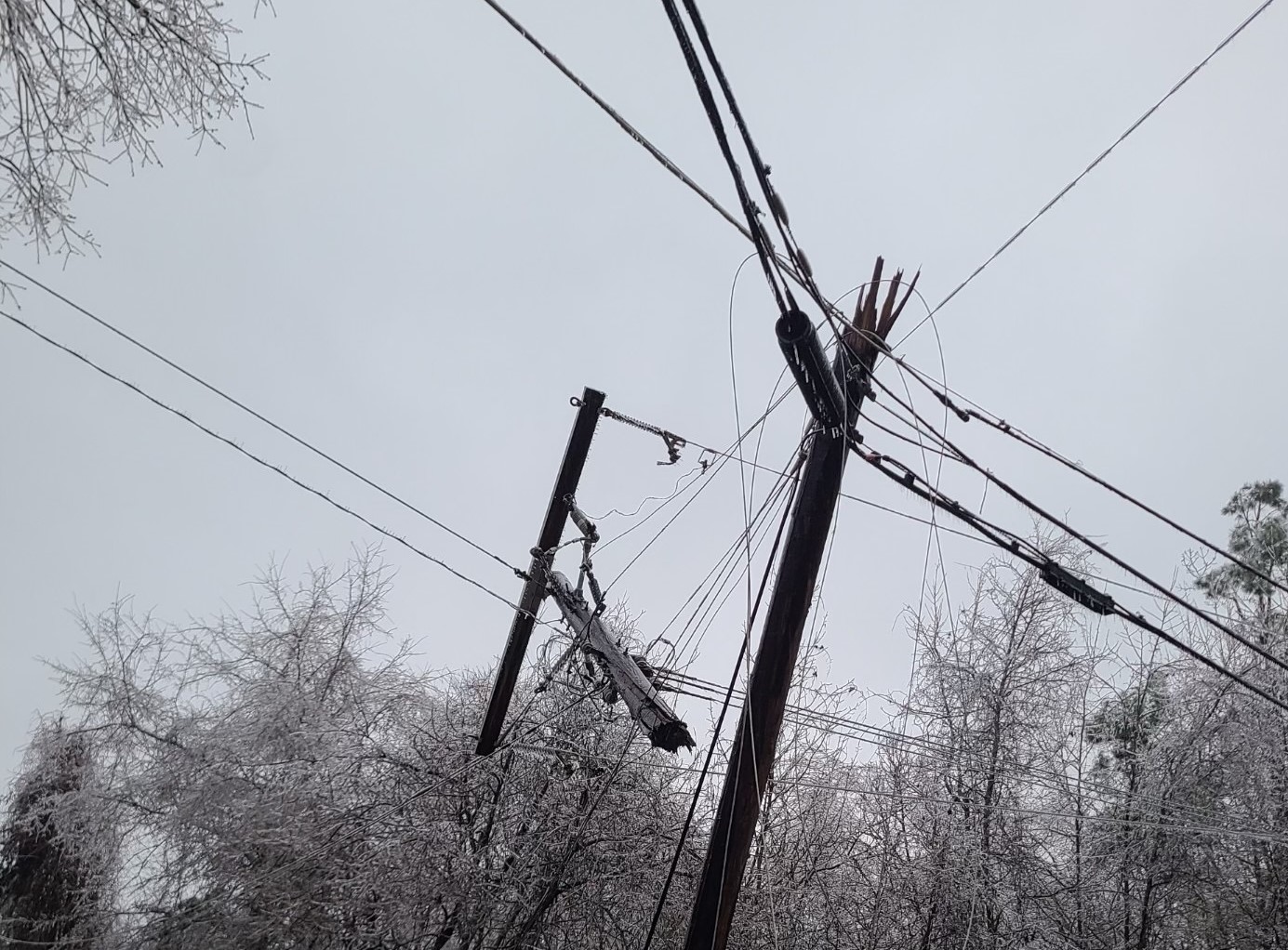 A broken pole in Warren damaged in the ice storm overnight