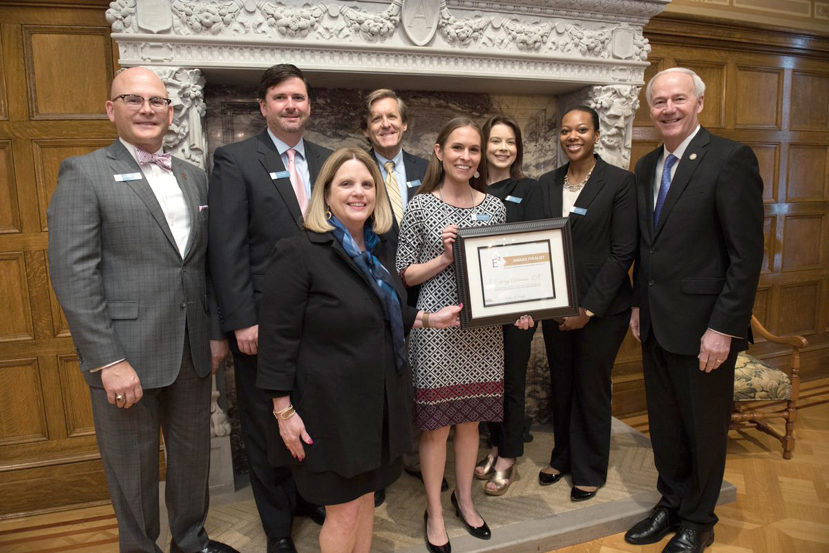 Arkansas Gov. Asa Hutchinson, right, is shown with (from left) Entergy Arkansas' John Bethel and Michael Considine, ADEQ's Becky Keogh, and Entergy Arkansas' Kurt Castleberry, Heather Hendrickson, Kerri Case and Sharnell Allen.