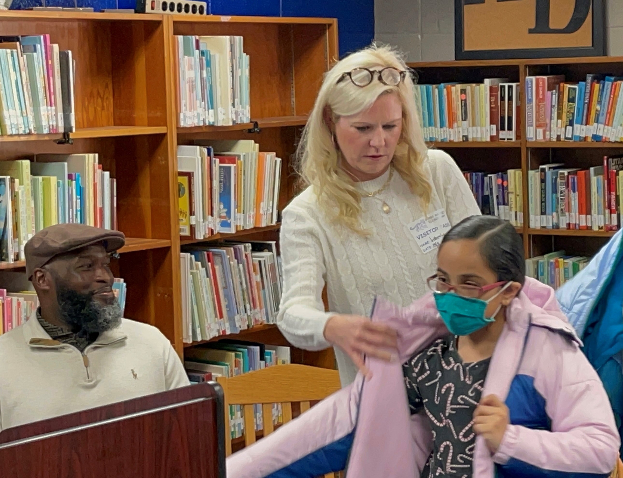 Entergy Arkansas and the Little Rock fire fighters provided coats to 800 students through Operation Warm.