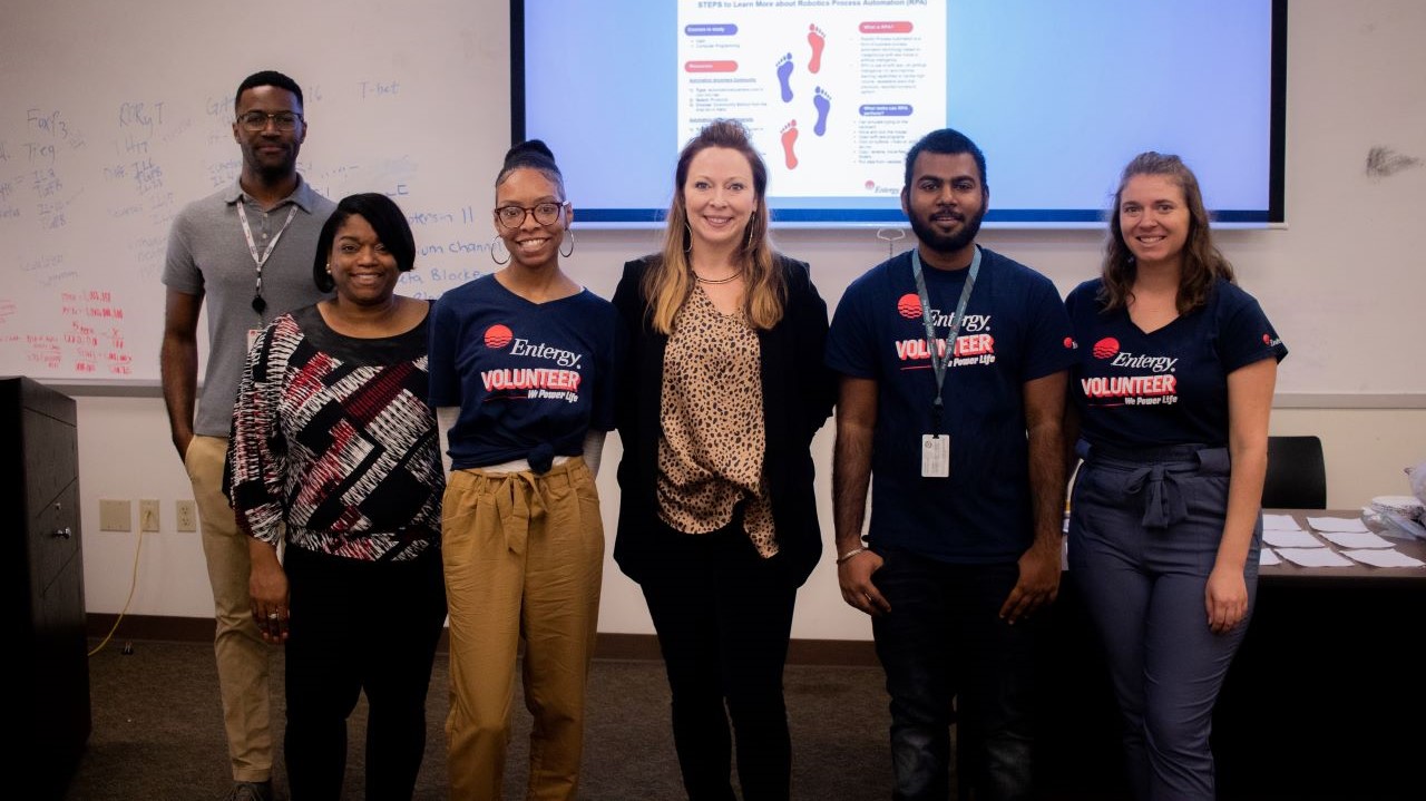 Julie Harbert, senior vice president of corporate business services, with the Entergy robotic process automation breakout team.