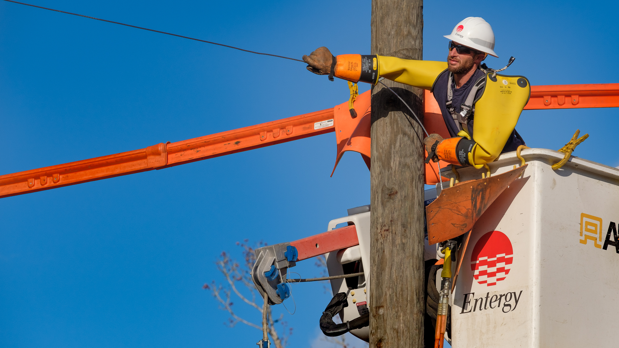 Entergy Arkansas Lineman Aaron Hearnsberger of Magnolia maintains the system. (File photo)