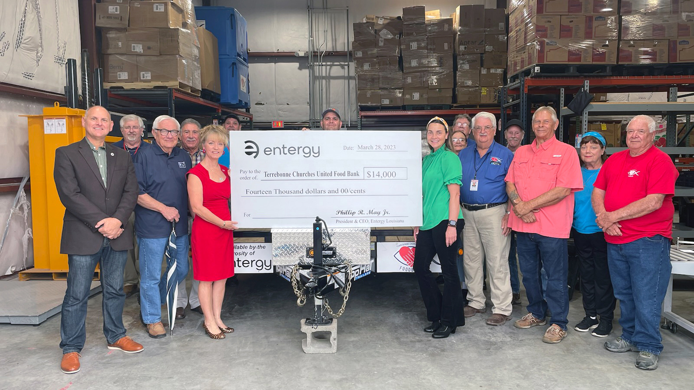 Pictured in the front row are Terrebonne Parish Councilman Darrin Guidry, Terrebonne Parish Councilman Daniel “Danny” Babin, Rep. Beryl Amadee, Entergy Louisiana Customer Service Manager Stacy Fontenot, Terrebonne Churches United Foodbank Executive Director Lawrence DeHart, Terrebonne Parish Councilman Dirk Guidry, Terrebonne Churches United Foodbank Board Member Carol Cambre and John Cambre. Picture in the back row are Terrebonne Churches United Foodbank Board President John Welch, Terrebonne Parish Manager Mike Toups, Danny Benoit, Jason Mayeaux, Terrebonne Churches United Foodbank Community Relations Director John “Spud” McConnell, Nancy Parisean and Matthew Clearwater.