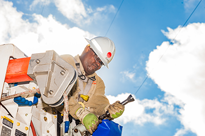 An Entergy Mississippi lineman works on a copper replacement project to improve service reliability. 