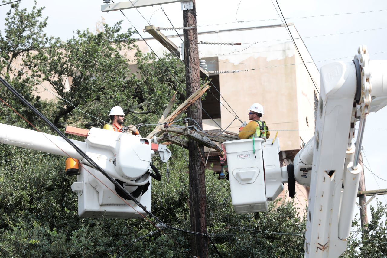 CREWS REPAIR DOWNED POWER LINES IN LOUISIANA