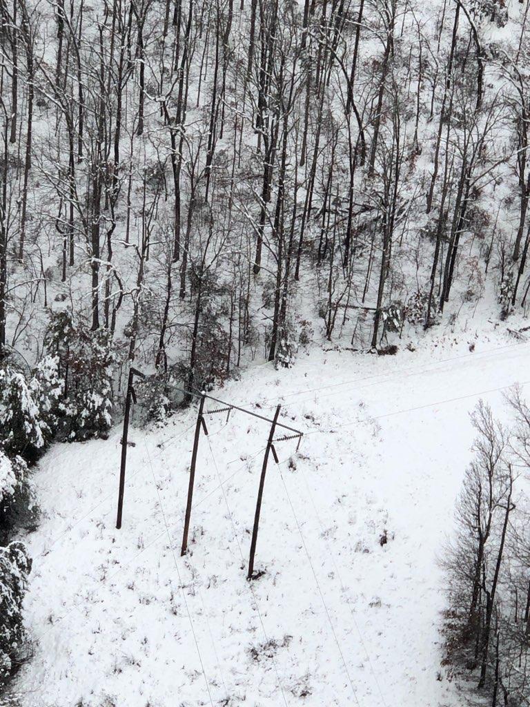 A winter storm dumped several inches of snow in areas and damaged equipment, including this power pole near Mountain View, and hampered access for Entergy Arkansas crews.