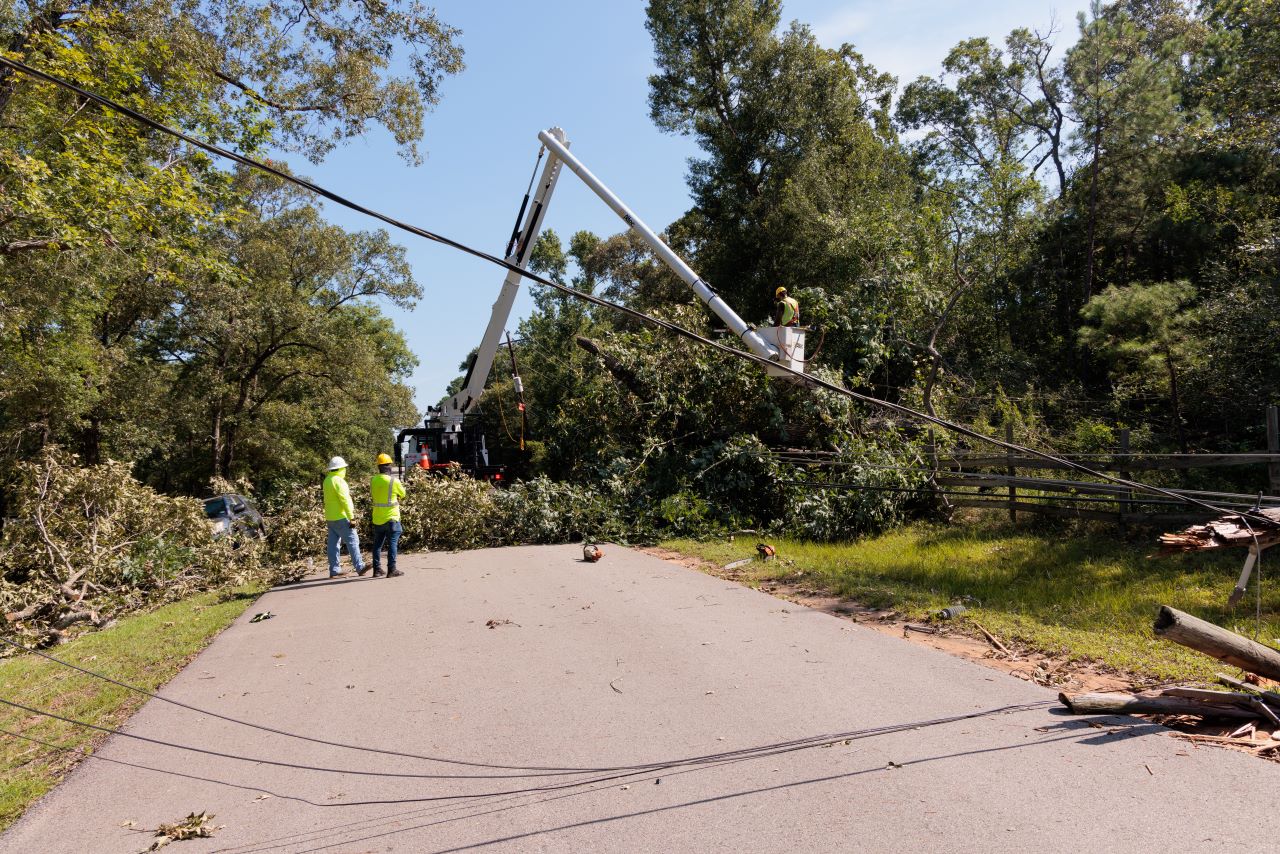 Crews make repairs to power lines in Montgomery County, Texas after Hurricane Beryl